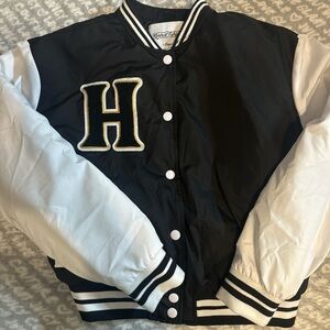 Black and White womens Puffer Jacket with 'H' Emblem